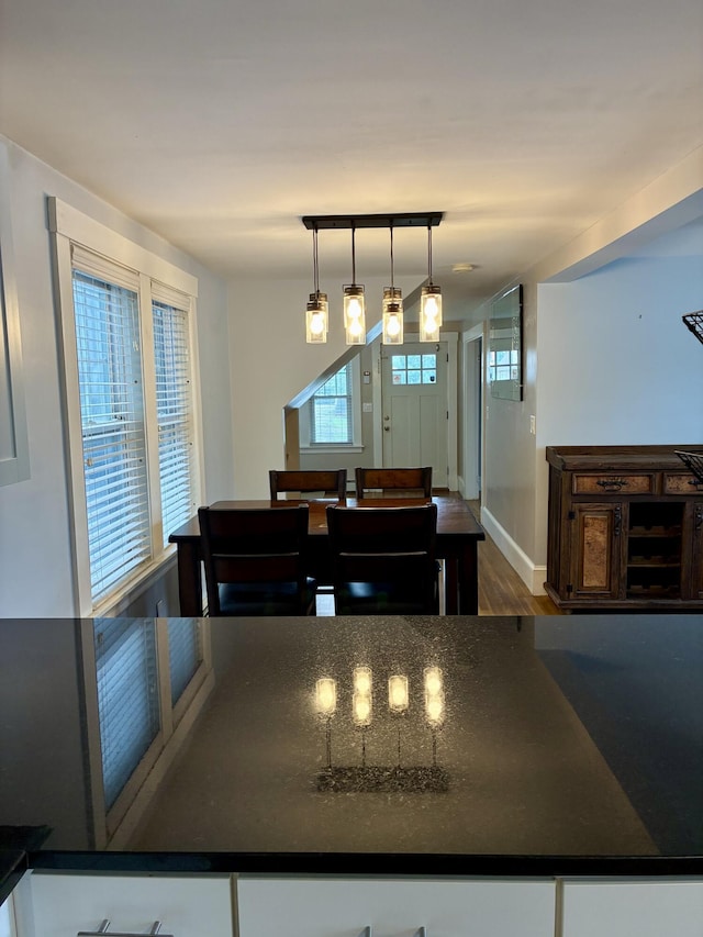 272 Center St, Bangor, ME 04401 - dining area with wood finished floors and baseboards