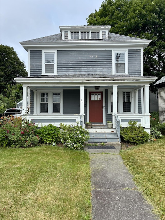 272 Center St, Bangor, ME 04401 - american foursquare style home featuring covered porch, a front lawn, and a shingled roof