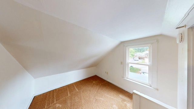 46 Crest Ave, Auburn, ME 04210 - additional living space featuring vaulted ceiling and light colored carpet