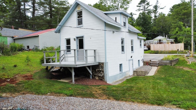 46 Crest Ave, Auburn, ME 04210 - back of property featuring a deck and a lawn