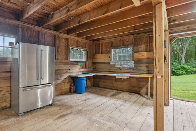 471 Methodist Rd, Westbrook, ME 04092 - kitchen featuring high end fridge, light countertops, wood walls, light wood finished floors, and wood ceiling