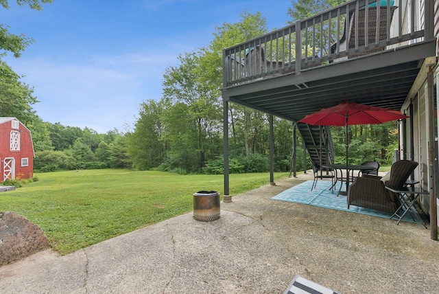 471 Methodist Rd, Westbrook, ME 04092 - view of green lawn featuring stairway, a patio, and a deck