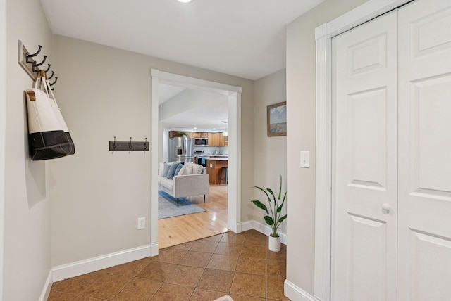 471 Methodist Rd, Westbrook, ME 04092 - hall featuring tile patterned flooring and baseboards