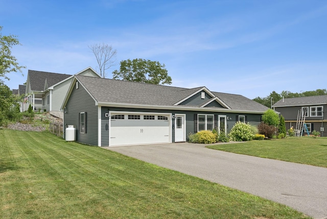 37 Homewood Blvd, Old Orchard Beach, ME 04064 - view of front of house featuring a garage, driveway, a front yard, and a shingled roof
