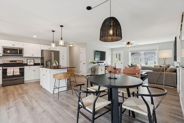 37 Homewood Blvd, Old Orchard Beach, ME 04064 - dining space featuring light wood-style floors, a ceiling fan, and recessed lighting