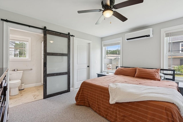 37 Homewood Blvd, Old Orchard Beach, ME 04064 - bedroom featuring an AC wall unit, a barn door, and multiple windows