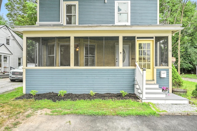38 Silvermount St, Waterville, ME 04901 - american foursquare style home with a sunroom