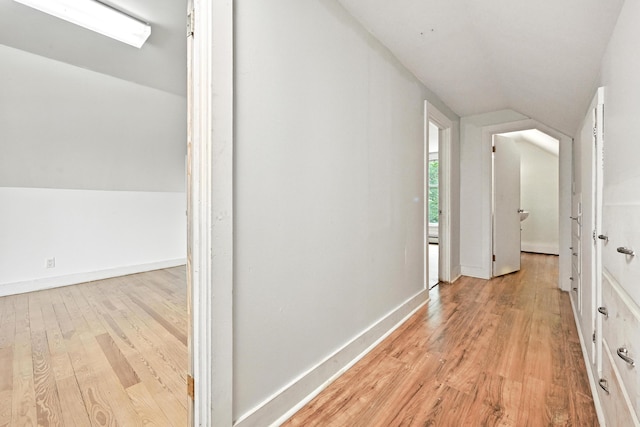 38 Silvermount St, Waterville, ME 04901 - corridor with vaulted ceiling and light wood-style floors