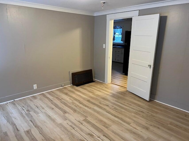 7 S Grove St, Waterville, ME 04901 - spare room with crown molding and light wood finished floors