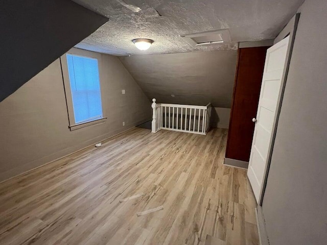 7 S Grove St, Waterville, ME 04901 - bonus room with wood finished floors, attic access, and lofted ceiling