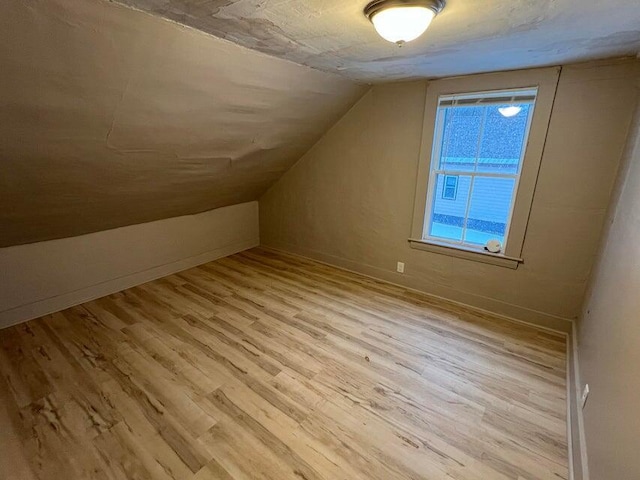 7 S Grove St, Waterville, ME 04901 - bonus room with light wood-style flooring and vaulted ceiling