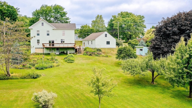 2887 Middle Rd, Sidney, ME 04330 - view of green lawn featuring a deck and stairs