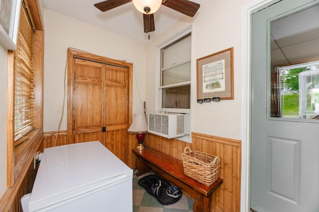 2887 Middle Rd, Sidney, ME 04330 - washroom featuring a wainscoted wall, wooden walls, and a ceiling fan