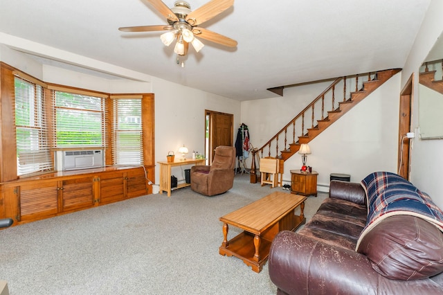 2887 Middle Rd, Sidney, ME 04330 - living area with stairway, carpet flooring, a ceiling fan, and a baseboard heating unit