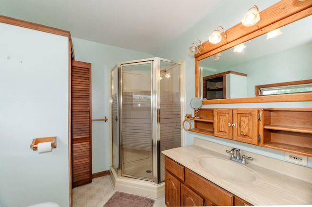 2887 Middle Rd, Sidney, ME 04330 - bathroom with a shower stall, vanity, and tile patterned floors