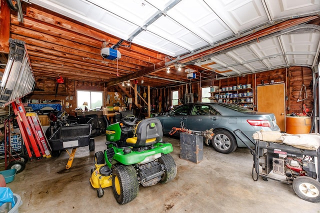 2887 Middle Rd, Sidney, ME 04330 - garage featuring a garage door opener