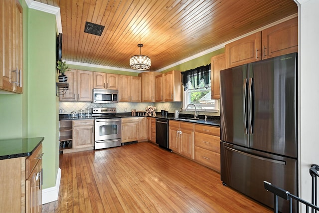 4 Hillcrest St, Waterville, ME 04901 - kitchen featuring stainless steel appliances, dark countertops, light wood-type flooring, ornamental molding, and wooden ceiling