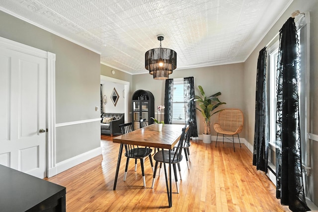4 Hillcrest St, Waterville, ME 04901 - dining room with light wood-type flooring and ornamental molding