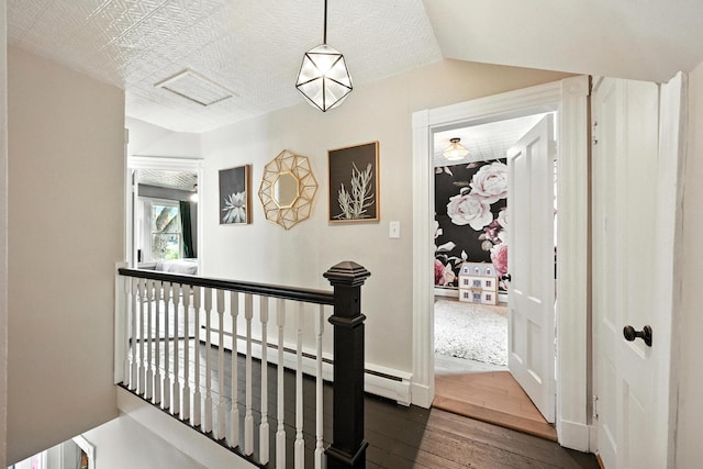 4 Hillcrest St, Waterville, ME 04901 - hall with an upstairs landing, dark wood-style flooring, and a baseboard radiator