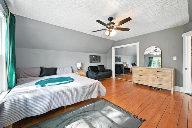 4 Hillcrest St, Waterville, ME 04901 - bedroom featuring hardwood / wood-style flooring, a ceiling fan, vaulted ceiling, and a closet