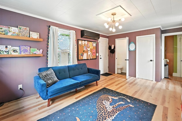 4 Hillcrest St, Waterville, ME 04901 - living area featuring crown molding, a wall mounted air conditioner, wood finished floors, a chandelier, and wooden walls
