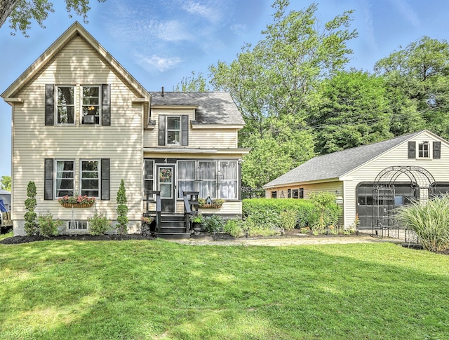 4 Hillcrest St, Waterville, ME 04901 - back of property featuring a sunroom and a lawn