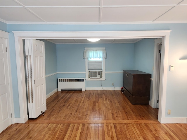 3 N Garand St, Winslow, ME 04901 - unfurnished room with radiator, wood-type flooring, and cooling unit