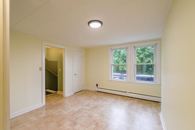 3 N Garand St, Winslow, ME 04901 - empty room with baseboard heating and baseboards