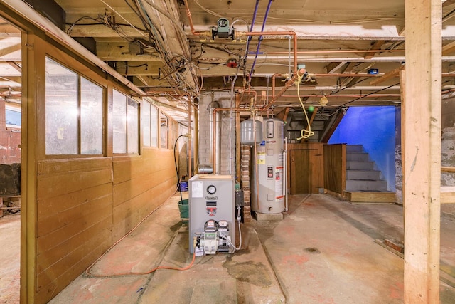 3 N Garand St, Winslow, ME 04901 - unfinished basement featuring water heater, stairway, and a heating unit