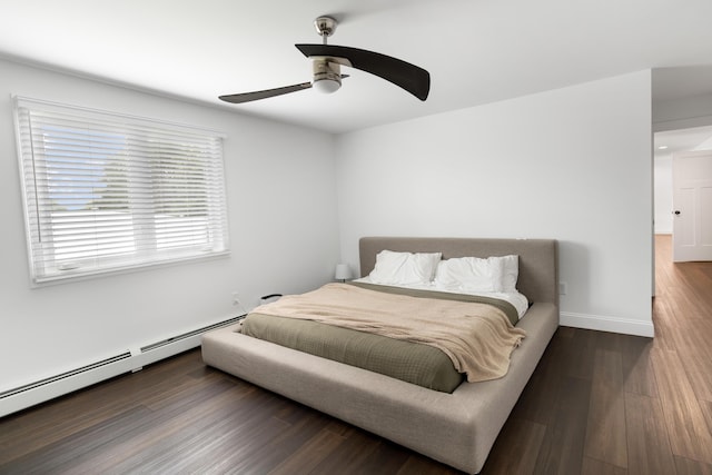 5 Fairview Ave, Auburn, ME 04210 - bedroom featuring wood finished floors, a baseboard radiator, and ceiling fan