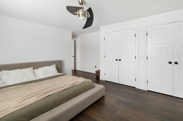 5 Fairview Ave, Auburn, ME 04210 - bedroom featuring two closets, dark wood-style floors, and a ceiling fan