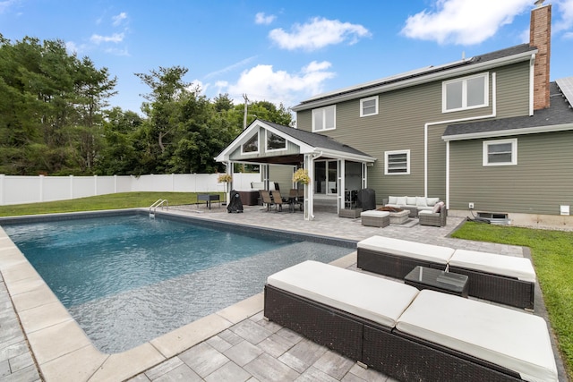 5 Fairview Ave, Auburn, ME 04210 - view of swimming pool with an outdoor living space, a patio, and a fenced backyard