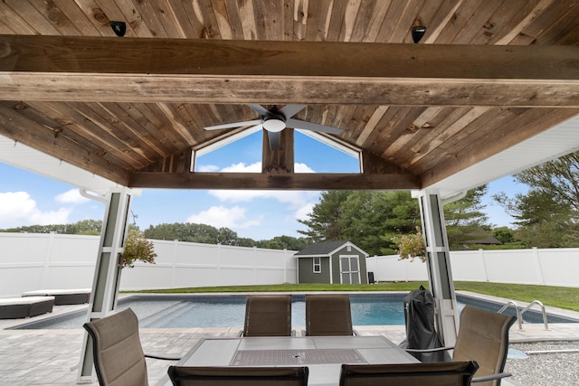 5 Fairview Ave, Auburn, ME 04210 - view of swimming pool with a fenced backyard, a ceiling fan, a gazebo, a shed, and outdoor dining area