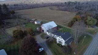 38 Atkinson Rd, Charleston, ME 04422 - aerial view of property and surrounding area featuring rural landscape