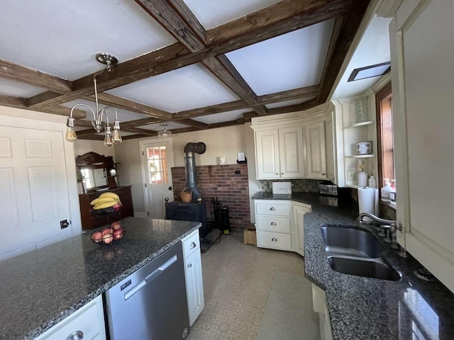 38 Atkinson Rd, Charleston, ME 04422 - kitchen featuring coffered ceiling, a wood stove, white cabinets, beam ceiling, and stainless steel dishwasher