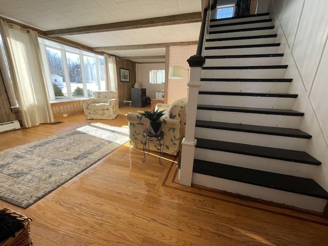 38 Atkinson Rd, Charleston, ME 04422 - stairs with beamed ceiling and wood finished floors