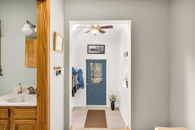 21 Bowling Green Ln, Belfast, ME 04915 - foyer with ceiling fan and light tile patterned flooring