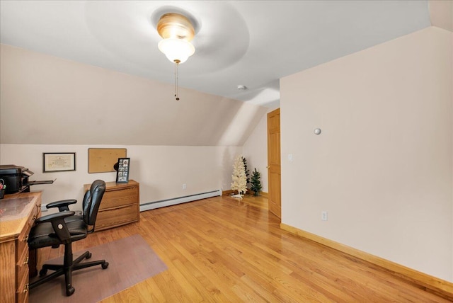 21 Bowling Green Ln, Belfast, ME 04915 - home office featuring baseboard heating, light wood-style floors, and lofted ceiling