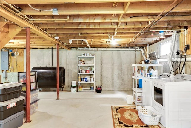 21 Bowling Green Ln, Belfast, ME 04915 - basement with independent washer and dryer, oil tank, and electric panel