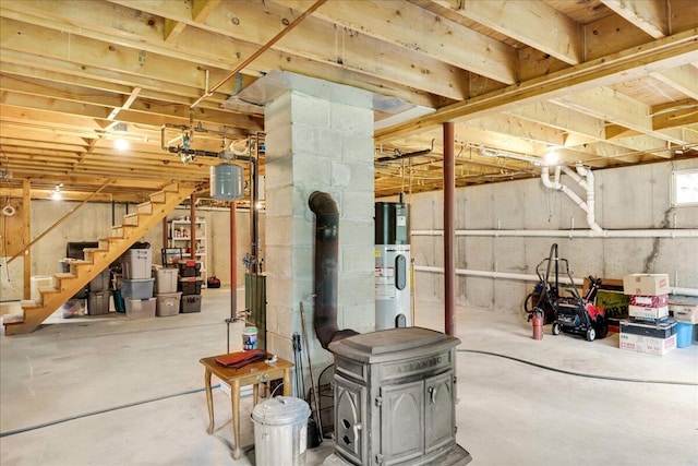21 Bowling Green Ln, Belfast, ME 04915 - unfinished basement with water heater and stairway