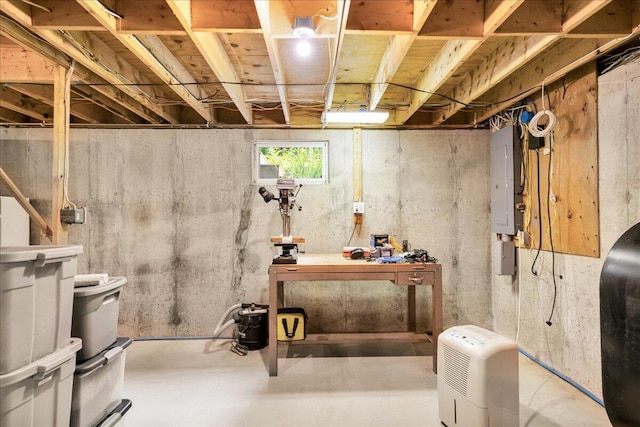21 Bowling Green Ln, Belfast, ME 04915 - basement with a workshop area and electric panel