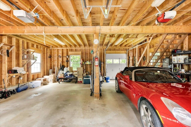 21 Bowling Green Ln, Belfast, ME 04915 - garage featuring a garage door opener