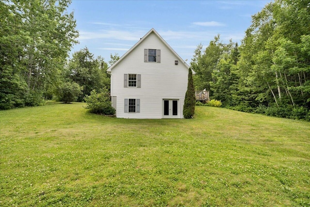 21 Bowling Green Ln, Belfast, ME 04915 - view of side of property featuring french doors, a yard, and a deck