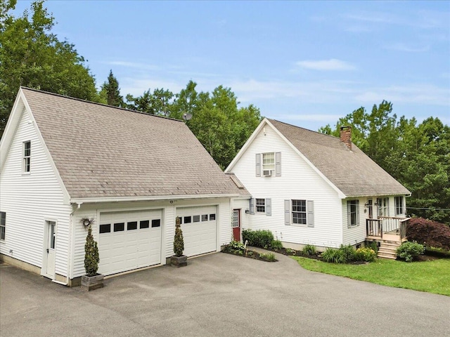 21 Bowling Green Ln, Belfast, ME 04915 - view of front of property featuring a chimney and a shingled roof