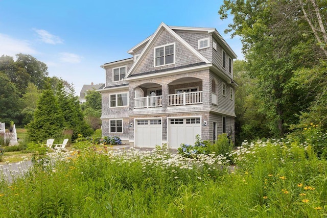 17 Intervale Rd, York, ME 03902 - view of front of house with a balcony and an attached garage