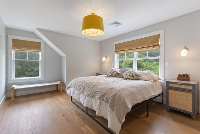 17 Intervale Rd, York, ME 03902 - bedroom with light wood finished floors and multiple windows