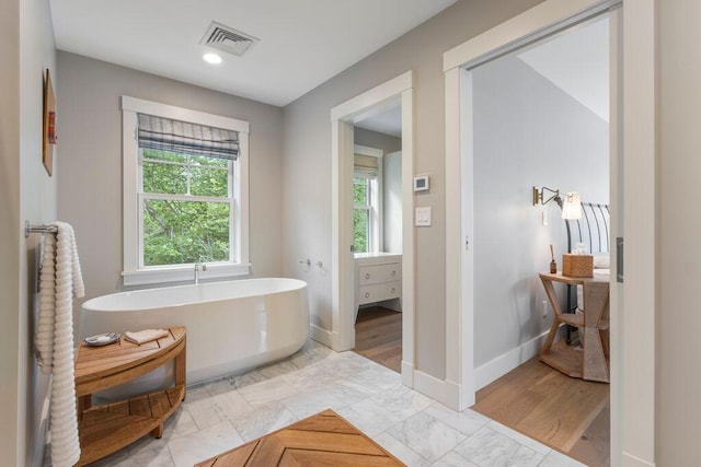 17 Intervale Rd, York, ME 03902 - full bathroom featuring plenty of natural light, a soaking tub, and recessed lighting