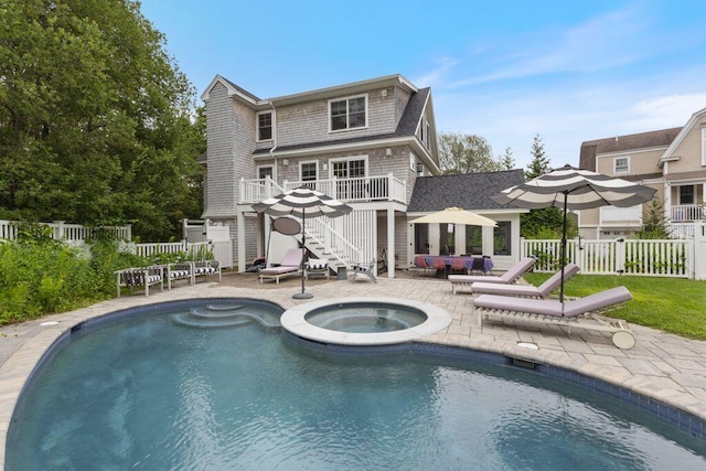17 Intervale Rd, York, ME 03902 - view of swimming pool featuring a patio, a fenced backyard, stairs, a pool with connected hot tub, and a wooden deck