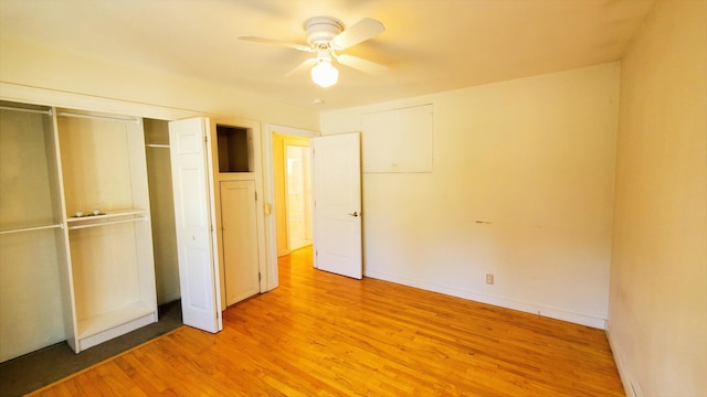 9 Wood St, Bangor, ME 04401 - unfurnished bedroom with light wood-type flooring, a closet, and a ceiling fan