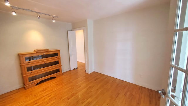 9 Wood St, Bangor, ME 04401 - unfurnished room featuring track lighting and light wood-style flooring